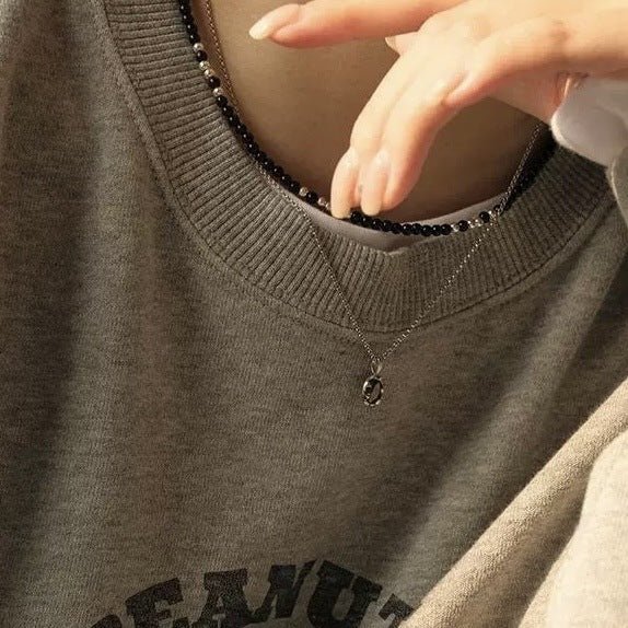 Black agate necklace layered with gold - plated copper collarbone chain - Lunaire Jewelry